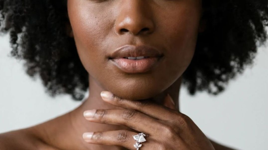 ⁣white gold marquise diamond floral solitaire engagement ring